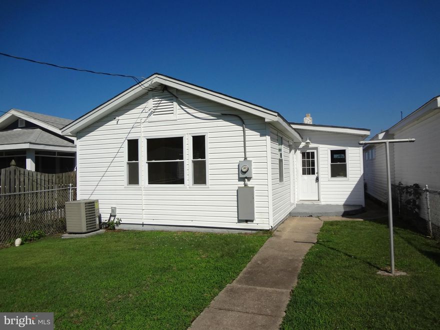 Cute Rambler that is Move-In Ready! New Plumbing, New Carpet, Fresh Interior Paint, Granite Counter Tops. Three season porch overlooking the water!  River and Beach view in front and bay out the back.  Walk to the Marina or cross Irving Ave to the beach. See Pictures for additional details! Roof, siding, windows,appliances, electrical, lighting, HVAC all updated 2010, Agent Owner