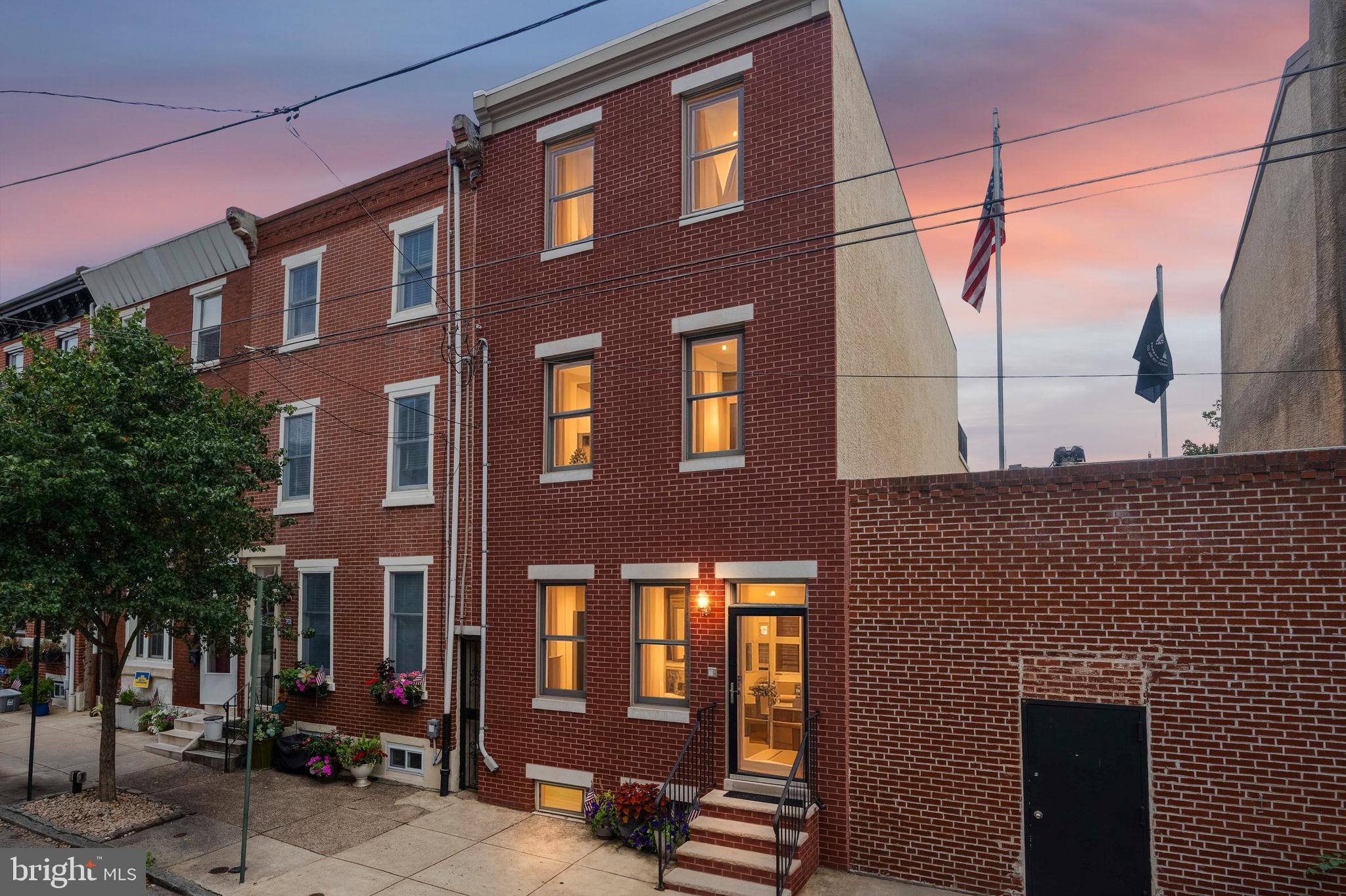 Welcome to 761 N 24th Street, a stunning 3-bedroom, 2.5-bath townhome in the heart of Fairmount’s Art Museum neighborhood. Freshly painted and professionally cleaned, this spacious and beautifully updated home features 9-foot ceilings, crown molding, and hardwood floors throughout. The main floor offers a bright open-concept layout with a large living and dining area, coat closet, convenient powder room, and a spacious kitchen with a center island. The modern kitchen boasts granite countertops and a separate wet bar with a wine cooler. French doors open to a private rear patio and garden. A spacious finished basement provides flexible space for a second living area, home office, or gym, along with a separate crawl space for additional storage. The second floor includes two generously sized bedrooms, a full bathroom, a laundry room, and a den off the wide hallway. The third-floor primary suite features a walk-in closet, en-suite bath, a separate sitting area with a second wet bar and mini refrigerator, and a private deck with beautiful city views. Additional highlights include dual-zoned HVAC, abundant closet space, and an unbeatable location near the Philadelphia Museum of Art, Kelly Drive, Fairmount Park, The Barnes, and many of the city’s best cafes, restaurants, and cultural attractions. This home offers the perfect blend of style, space, and location. Easy to show. Schedule your tour today!