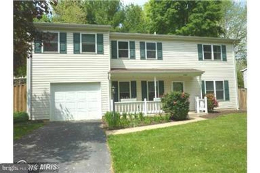 Spacious home has many upgrades to include the extended master suite w/large sitting area. Kitchen has updated w/new stainless appliances,refinished hardwood floor, new carpet upper level.  Huge walk-in master bedroom closet with built-in.,Family room w/wood burning stove & walk-out to deck.  Please text LA for showing.  Thanks.