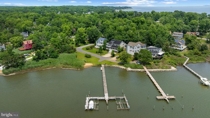 Big views, better value—now offered at a newly adjusted price, this Arundel-on-the-Bay gem is your gateway to Chesapeake waterfront living.

Perfectly perched to capture peaceful views of Fishing Creek, this home offers the rare opportunity to enjoy water access, a private community pier, and coastal serenity just minutes from downtown Annapolis—all at an unbeatable value.

Wake up to shimmering water vistas and end your day watching the sunset from the gracious front porch. Inside, rich hardwood floors and an airy coastal palette reflect the natural light pouring in from every angle. The open-concept main living area, thoughtfully designed kitchen, and oversized garage with ample storage make everyday living and entertaining a breeze.

With four spacious bedrooms and three and a half baths, there’s room for family and guests, while the fully fenced backyard offers a private escape for morning coffee, evening cocktails, or summer crab feasts.

Whether you're seeking a weekend retreat or your forever home, this is your chance to live the waterfront lifestyle—without the waterfront tax bill. Don’t miss this incredible value in the sought-after Arundel-on-the-Bay community. Schedule your private tour today.