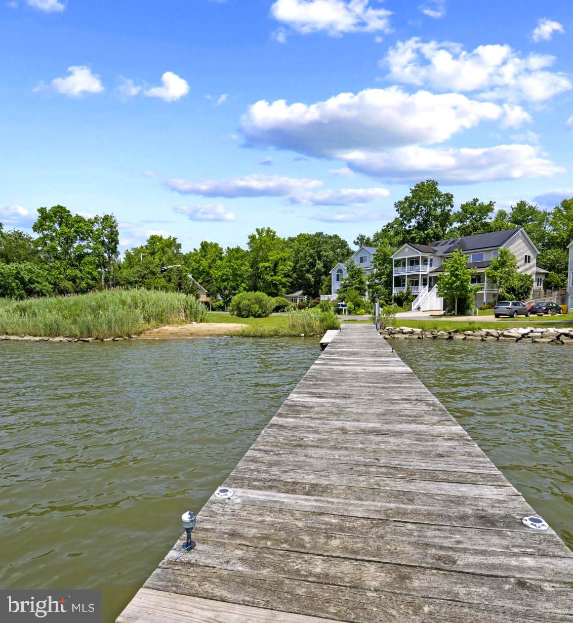 Coastal elegance meets everyday comfort in this stunning Arundel-on-the-Bay home, perfectly perched to capture peaceful water views of Fishing Creek. From the moment you arrive, this residence promises an elevated lifestyle—whether you're entertaining in the open-concept main living area, savoring a quiet evening on the gracious porch overlooking the water, or launching your next adventure from the oversized garage with room for all your gear.
Inside, rich hardwood floors flow throughout the home, complementing the airy coastal palette and natural light pouring in from every angle. The thoughtfully designed kitchen and dining spaces make hosting effortless, while three spacious bedrooms and two and a half stylish baths offer plenty of space for family and guests alike.
The fully fenced backyard is a private oasis for morning coffee, summer BBQs, or evenings under the stars. And when the day winds down, there’s nothing better than watching the sun reflect off the creek from your own slice of Chesapeake paradise.
Located in the sought-after Arundel-on-the-Bay community—just minutes from downtown Annapolis yet a world away—this home is the perfect blend of charm, function, and waterfront serenity.