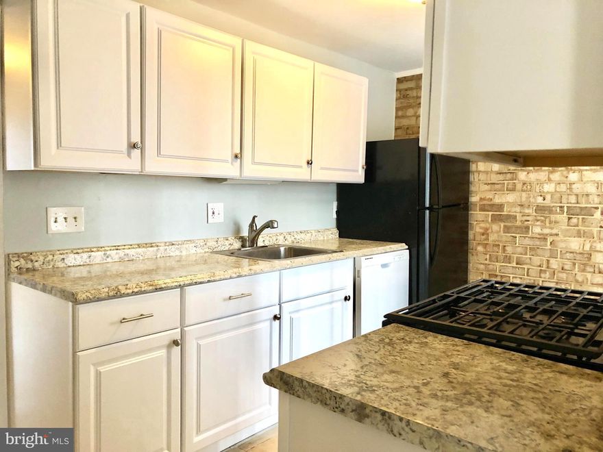 ALL UTILITIES INCLUDED!  Move-in ready 2 bedrooms and 1 bath in the sought-after Huntley Square Condos.  Recently upgraded bathroom and kitchen with S/S appliances, eat-in kitchen area, and large pantry with an open plan L-shaped living & dining room area that walks out into the balcony.  Washer & Dryer in the unit, hardwood flooring, and lots of storage space.  The pool is outside your doorway.  Convenient access to Beltway, near National Harbor, and outlets.