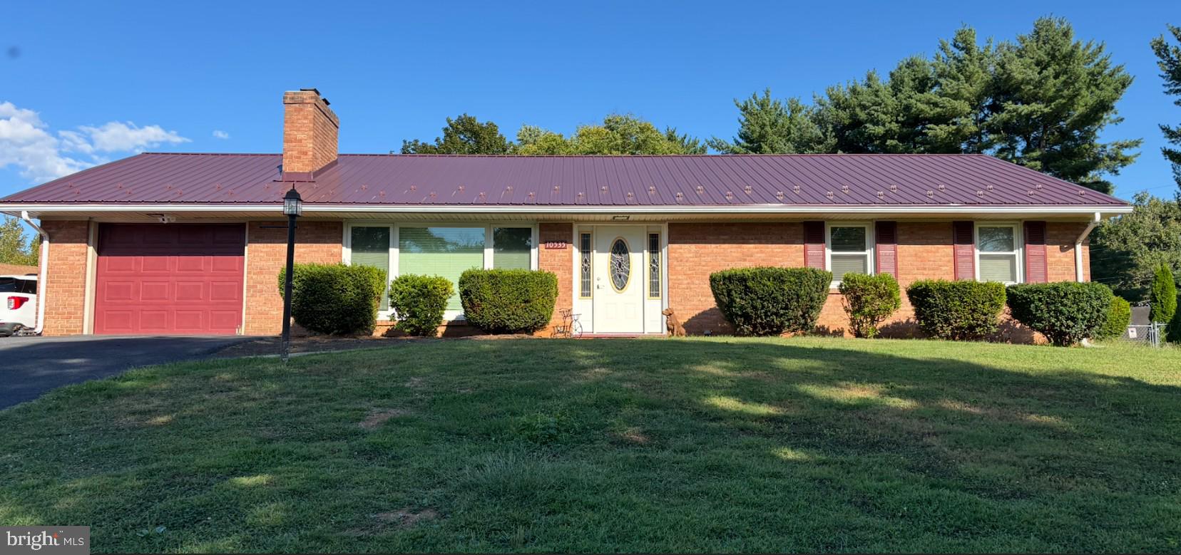 Charming brick rancher with a 3-year-old metal roof in a desirable neighborhood perfect for evening walks! This home features 2 bedrooms upstairs (including a primary with half bath and walk-in cedar closet) with hard wood floors, plus a possible 3rd bedroom in the partially finished basement with large closets.
The updated open kitchen shines with luxury vinyl flooring, new countertops, backsplash, and stove, and flows into the bright dining area with luxury vinyl floors, a new pellet stove, and a convenient closet with stackable washer/dryer hookup. The cozy living room offers hardwood floors, a new front door and window, and a beautiful working wood-burning fireplace.
Downstairs, the basement provides flexible living space—half finished and half unfinished—with plenty of storage areas and a washer/dryer.
Other updates include new windows in the bedrooms and a brand-new heat pump being installed. Step outside to enjoy the fenced backyard with a concrete patio accessed by sliding glass doors—perfect for relaxing or entertaining. There is also a Shed to store things.
Don’t miss this well-cared-for home with so many updates and a great setting!