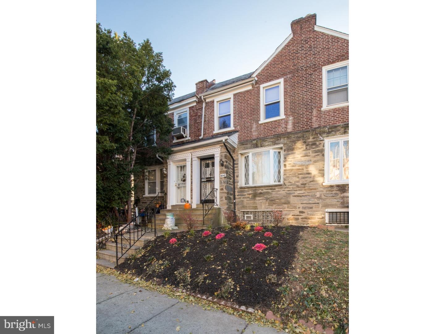 Situated in this Quaint East Mount Airy neighborhood, amongst stone mansions, and private residences, this brick and stone front row home boasts over fourteen hundred interior square feet, three spacious bedrooms, one and a half bathrooms, gleaming hardwood parquet floors, and a beautiful planted front garden. Enter through the handsome foyer to a huge natural light filled living area followed by a formal dining area and a chefs eat-in kitchen with a newer stainless steel stove and tons of counter prep areas. There is also an entrance to the finished lower level here, housing plenty of room for a den/ theater room, a convenient powder room, laundry and a garage with an electric opener. The second floor has three huge bedrooms, all with an abundance of closet space, and a designer ceramic four piece bathroom including a deep soaking tub and a stand up shower. This move in ready abode is clean, ready for a new homeowner, and located in one of Philadelphia's finest locations. Look at the pictures, they do not lie.Set your appointment today!! Check OPA for 2019 taxes due to possible citywide reassessment.