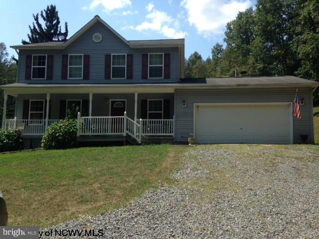 Enjoy this private country retreat! 18 1/2 beautiful acres with spacious colonial w front porch, back entertaining area plus 2 car attached & 2 car detached garage! Over 2000k fin. sq. ft, eat in kitchen with island, large master bedroom and master bath w/ separate Jacuzzi. Large closets. $3k carpet & paint allowance w/ acceptable offer!