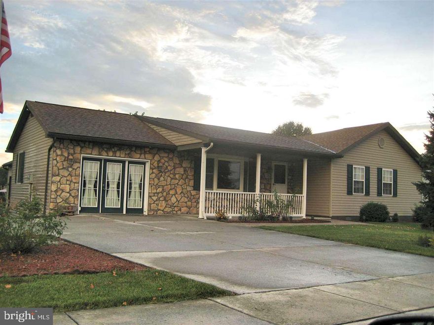 Fantastic rancher with 2BR/2BA located on beautiful lot. This home has over 1700 sq ft of space on first floor. Enjoy the Large Master Bedroom with sunken tub, walk-in closet and separate shower. Entertain guests in the formal living room or family room located off the kitchen. Attached to the home is a gigantic 2 1/2 car garage ready for the enthusiast. Enjoy the evening outside on the covered deck or paved patio with a fire. This is a looker!