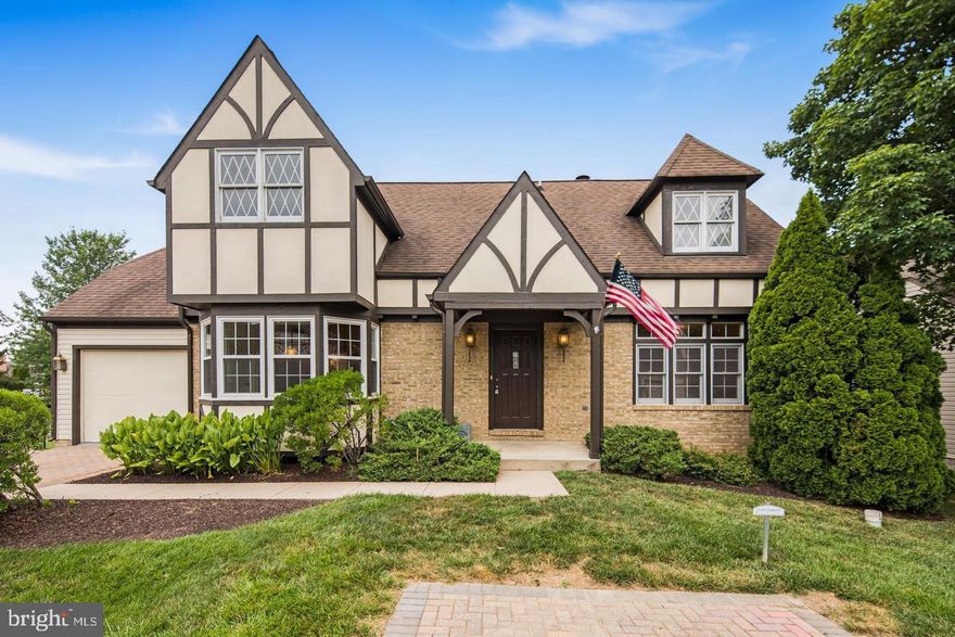 Nestled in the heart of sought-after Wormans Mill, this beautifully maintained residence offers over 3,000 square feet of thoughtfully designed living space with timeless charm and tasteful updates throughout. From the moment you arrive, the classic Tudor-inspired exterior and welcoming front porch set the tone for the warmth and character inside. One of the home’s most desirable features is the main-level primary suite with a large walk-in closet, providing convenience, privacy, and true one-level living if desired. The main floor also showcases hardwood floors and a welcoming living room anchored by custom built-ins and a cozy fireplace—perfect for relaxing evenings or entertaining guests. The dining room is bright and refined, while the kitchen offers ample workspace and a sunny breakfast area overlooking the front landscape. Main level also offers a light filled sunroom, sure to warm you up on these cold blustery days. Upstairs, you’ll walk up to an oversized loft area, perfect for a game room or home office along with two generously sized bedrooms and a full bath. The finished lower level expands your living space even further with one additional bedroom, guest room, bonus room and a large living area offering incredible flexibility for multigenerational living, work-from-home space, gym, or recreation. Step outside to a private patio and yard—perfect for morning coffee or summer entertaining. All of this is just steps from Wormans Mill’s shops, restaurants, pool, walking trails, and the vibrant downtown Frederick scene. A rare opportunity to own a spacious, move-in-ready home on Bear Den Road with a main-level primary suite—schedule your private showing today.