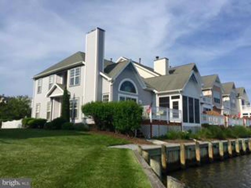 Warm, Welcoming Waterfront Townhome offers Spectacular Views of the Bay & Ocean City Skyline! End Unit features 1st Floor Master BR Suite, Cherry HW Flooring thru out Main level & Spacious Great Room w/Gas Fireplace! 3 Season Sunroom w/attached Deck for Relaxing & Watching the boats go by! Walk to Marinas, Pools, Dining & Entertainment at the Yacht Club. Short drive to Private Beach Club in OC!