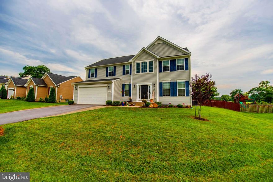 ONLY SIX YEARS OLD AND BETTER THAN NEW. THE HOME HAS BEEN IMPROVED WITH A FINISHED BASEMENT INCLUDING AN UNBELIEVABLE STONE ACCENTED WET BAR, A GREAT RECREATION ROOM AND A THIRD FULL BATH. THIS 4 BEDROOM/3.5 BATH HOME FEATURES AN OPEN FLOOR PLAN TO INCLUDE; TWO STORY FOYER / FORMAL LIVING & DINING ROOMS / GOURMET KITCHEN / SUNROOM WITH WOODSTOVE / LARGE FAMILY ROOM / SPACIOUS MASTER SUITE WITH LUXURY BATH / BEDROOM LEVEL LAUNDRY / TWO CAR GARAGE AND A FENCED BACK YARD WITH CUSTOM CONCRETE PATIO. ALL OF THIS IS LOCATED ON A QUIET CUL-DE-SAC AND BACKS TO OPEN FARM LAND FOR PRIVACY. THIS SOUTH BERKELEY COUNTY LOCATION IS QUIET AND PEACEFUL YET CONVENIENT TO I-81 AND IS IN THE SOUGHT AFTER MUSSELMAN SCHOOL DISTRICT. COMPETITIVELY PRICED, THIS BEAUTIFUL PROPERTY WILL NOT LAST LONG. SO MAKE YOUR APPOINTMENT TO VIEW IT NOW!