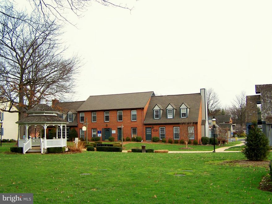 In the heart of Great Falls at the Village Centre, 2nd floor office space overlooking Village Green! Two private offices and large, open reception/common area. Windows provide lots of natural light. One office with built-in bookcases. Ample surface parking. Walk to restaurants and post office. Signage available.  Enter from courtyard. Across street from Safeway and Starbucks. Available June.
