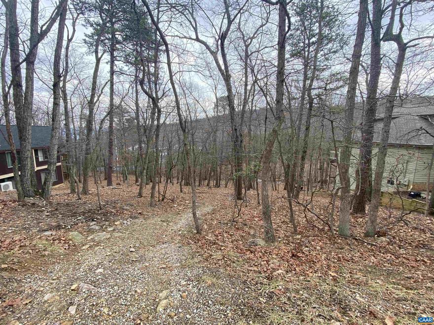 Offer has been accepted waiting on final signatures. Scenic building lot located in sought after Massanutten less than 5 minutes to the slopes! This wooded lot is convenient to Massanutten amenities and is ready for you to build your new mountain retreat. This property is less than 10 minutes from Route 33 and 20 minutes to Harrisonburg amenities and JMU.