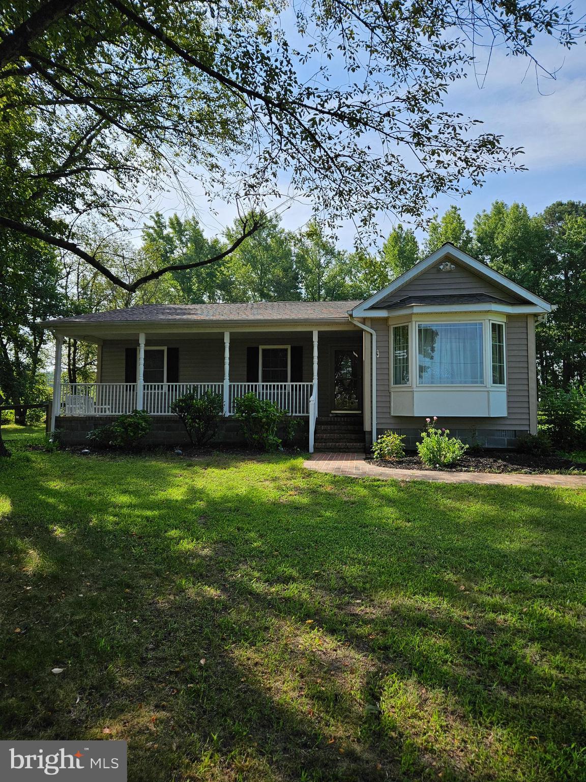 Don't miss this large home on 1.4 country acres with lots to offer! Home has 3 bedrooms 3 baths, and an office that could be an additional br and a play room. As you enter the home from the front porch the warm and welcoming living room awaits you with it's wood floors and stone fireplace with built in shelving. The large kitchen with an extra wall of pantry cabinets, extra freezer and upgraded counters will have the chef in you smiling. There is a walk in pantry, Rinnai tankless water heater and laundry room with newer washer and dryer close by. The separate dining room boast wood floors and opens to the inviting screened porch to the side of the home and out doors. The spacious master bedroom is at the rear of the home and opens to a wrap around deck overlooking the back yard and inground pool. A spa like master bath with jetted tub and large walk in shower is a wonderful respite from a busy day. The roof is approx 5 years old. Pool liner is 4 -5 years. Come and see all this home has to offer!
