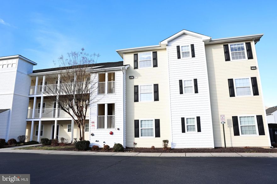 Welcome to living in the Villages at Millwood! This beautiful 3-bedroom, 2-bath third-floor unit offers a bright and open layout designed for both comfort and convenience. Step inside to find an open-concept kitchen and living room, perfect for everyday living and entertaining. The kitchen features a center island with bar seating, providing the ideal spot for casual meals or gathering with friends. Just off the living room, a sliding glass door leads to the four-seasons room, offering additional living space to enjoy year-round. The spacious primary suite includes a private bath with dual vanity sinks, while two additional bedrooms share a full hallway bathroom—perfect for guests, a home office, or extra space. Enjoy a prime location close to shopping, dining, and all that Millsboro has to offer—schedule your showing today!