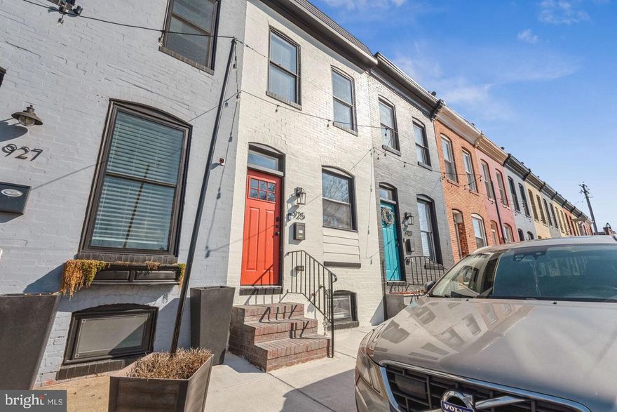 Don’t miss this rare opportunity to own this 3-bedroom, 3-bath home in the city with tons of surrounding green space — a true gem! Perfect for Live Near Your Work Grant, this home is perfectly positioned in front of a wide open grassy area with park benches, next to a large dog park, and just steps from another park behind the home. Inside, you’ll find luxury vinyl plank flooring throughout, a bright white kitchen with Quartz countertops, an island with a built-in wine fridge, stainless steel appliances, and high-end finishes throughout. The fully fenced backyard can easily be converted into a private parking pad if desired. Upstairs offers a spacious primary suite with its own full bath, a second bedroom, hallway bath, and stackable washer/dryer. The fully finished basement includes a third bedroom, third full bath, and a flex space perfect for a home office or lounge. Located within walking distance to Johns Hopkins, this move-in-ready home checks all the boxes — schedule your showing today!