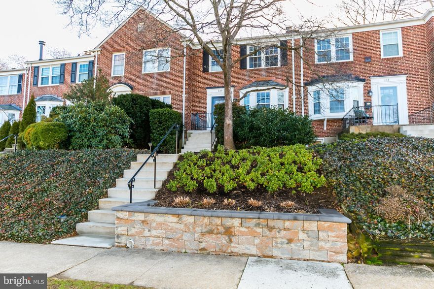 Stunning 3BR town home in pristine, move-right-in-condition!  Many recent updates include open kitchen renovation with stainless steel appliances and granite counters, renovated bathrooms, architectural shingle roof, front retaining wall,  professional landscaping front and back, storm doors, tilt-to-clean replacement windows, custom honeycomb window shades, water heater, and top-of-the-line ceiling fans.   Spacious, sunny rooms freshly repainted in custom neutral colors!  Rear deck leads to lower patio in fully fenced, easy maintenance yard.  Completely finished lower level includes family room with half bath,   room off laundry area that could be office or exercise room, and several storage closets.  This is not a flip - every update is top quality, and every detail has been attended to.  You will never find another home this immaculate!   And it's on a wide, tree-lined street with ample parking (including a paved private parking pad in back) in the highly-rated Rodgers Forge public school district!