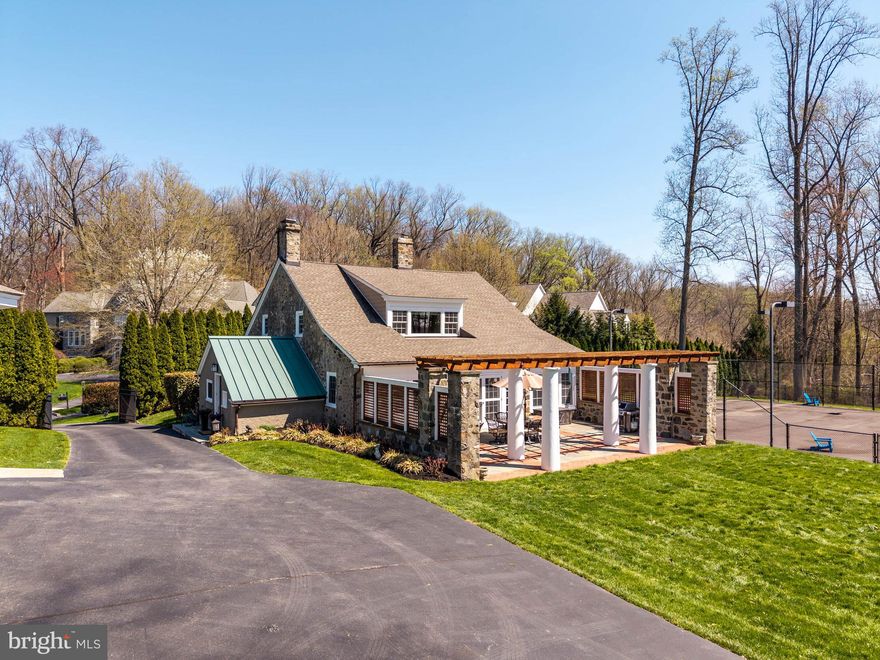 Enjoy breathtaking sunsets and majestic views every day!  This beautifully and meticulously restored Carriage House is truly special.  This Carriage House affords gracious living areas while maintaining the charm and character of yesteryear.  All Stone with gorgeous Millwork throughout, this unique and warm property will have you enjoying quiet nature from every corner.  Enjoy this lovely home residing on expansive 1.3 plus acres of land with a professional-sized Tennis Court, currently in use as Sport court, and a Full Two Car Garage with storage galore.  This exceptional Carriage House offers a Cul-De-Sac setting with mature plantings along with an oversized manicured lawn beckoning play and garden parties.  As you enter the Carriage House Cottage, you are greeted with a beautifully designed Antechamber with Custom Slate Flooring which opens to a sun-drenched Living Room/Dining Room area  featuring a stunning Stone Surround Fireplace  just restored in the last year; French Doors to a gorgeous Pergola with Stone Courtyard, magnificent Pillars and masonry completed with the finest of craftsmanship; and a Country Kitchen with all the amenities of today, while feeling like a step back to a simpler time with fabulous Dutch Barn Door overlooking flowering lush lawn.  The First Level also features a perfectly located Designer Powder Room; Full Stackable Laundry tucked away; a very special Office Space for necessary quiet time; and beautiful Open Staircase to the second level.  The Upper Level of this desirable home overlooks the great lawn with accompanying wooded views;  a Primary Suite with double windows providing an abundance of light, along with a Full Double Closet and luxurious Full Frameless Shower Bath; two additional welcoming Bedrooms generously proportioned, each thoughtfully designed with comfort and style in mind, share a Full Hall Bath with Tub/Shower combination providing the perfect arrangements for family and guests!  This home has been renovated and maintained with precise attention to detail.  Beyond the walls, the property unfolds onto a secluded outdoor retreat.  This is a rare opportunity to enjoy a bit of history while living with all the sights and sounds of nature.  This delightful and welcoming home is perfectly located just minutes from newly developed Newtown Square Center with all the necessities available at a moment’s notice.