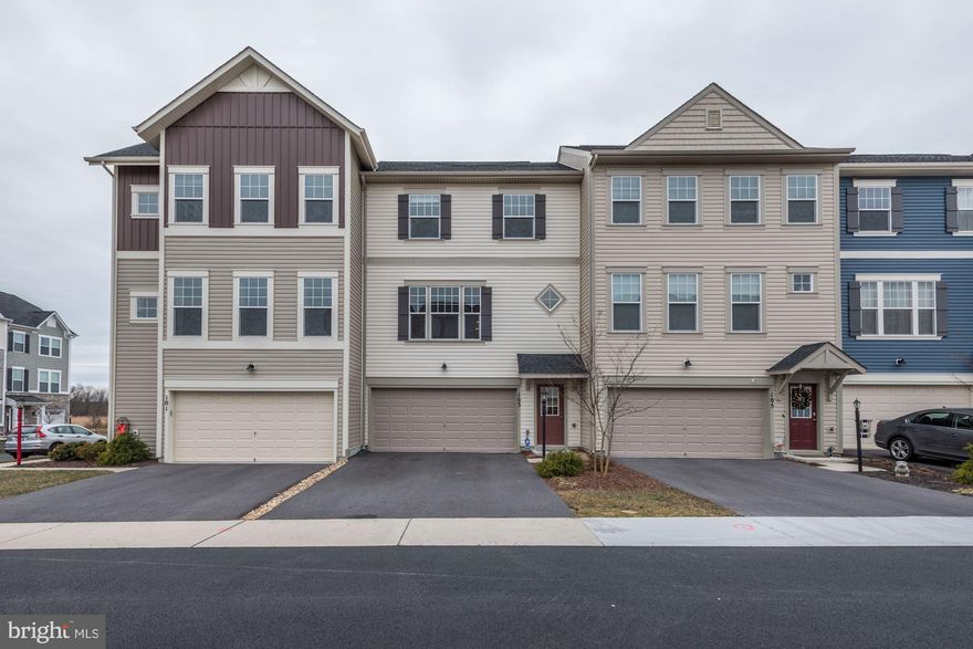 Fantastic luxury 3-level, 3-bedroom, 3.5-bathroom townhome backing to farmland. Enjoy privacy & unrestricted views from a 12 x18 deck.  Over 2,600+ sq ft of beautifully finished living space. 2-car garage w/opener. Hardwood floors, granite countertops & center island in this open-floorplan kitchen & breakfast area. You will love this light-filled home! Free access to community amenities including the swimming pool, tennis courts, tot lot, picnic pavilion, walking trails, and more! Owner/Agent.