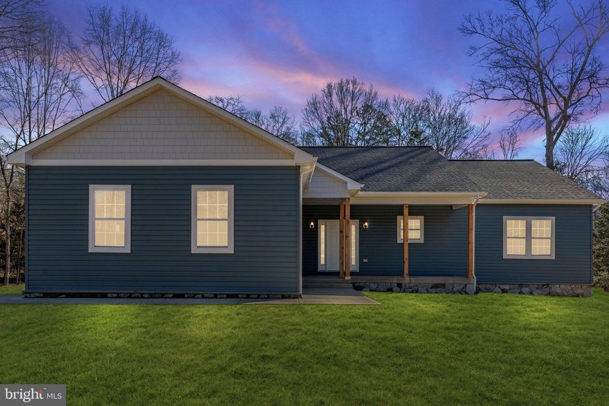 Discover the opportunity to build your dream home on a beautifully wooded 1.26-acre lot, tucked away for privacy with clearing only for the home and drainfield. Located in the highly desirable area of Warrenton, this custom-built home blends modern craftsmanship with peaceful, natural surroundings—all just minutes from town conveniences. Estimated build time is 6–8 months from permit to close.

Step inside this 4-bedroom, 2.5-bathroom home and experience an open, functional floor plan designed for everyday living and effortless entertaining. The living room boasts a cathedral ceiling and a beautifully crafted fireplace that serves as the focal point of the space. High-quality finishes include luxury vinyl plank flooring throughout, black fixtures, and white cabinetry throughout, creating a bright and welcoming interior. The kitchen features quartz countertops, ample storage, and a seamless flow into the dining and living areas. Both full bathrooms are adorned with granite countertops, while the owner’s suite offers a spa-like retreat with a walk-in tiled shower, double vanity, and tile flooring.

A spacious Jack and Jill bathroom connects two of the secondary bedrooms and includes tile floors, a tub/shower combo, a double vanity, and plenty of storage—ideal for families or guests. An unfinished basement with rough-in plumbing provides endless potential to expand, customize, or create additional living space. Outside, the home showcases vinyl board and batten siding, wood porch beams, and a setting that maximizes natural privacy—perfect for those wanting the feel of a secluded retreat without sacrificing proximity to Warrenton amenities. 

This home is fully customizable, offering countless upgrade options so you can personalize everything from the siding and flooring to cabinetry, tile, and countertops. Photos are similar as shown as these are from a previously built model home and upgraded from standard features. Internet is buyers responsibility. The road to the driveway as well as the driveway will be paved. Don't miss the opportunity to build a truly custom home in one of Warrenton’s most desirable locations! Reach out today to start designing your dream home.