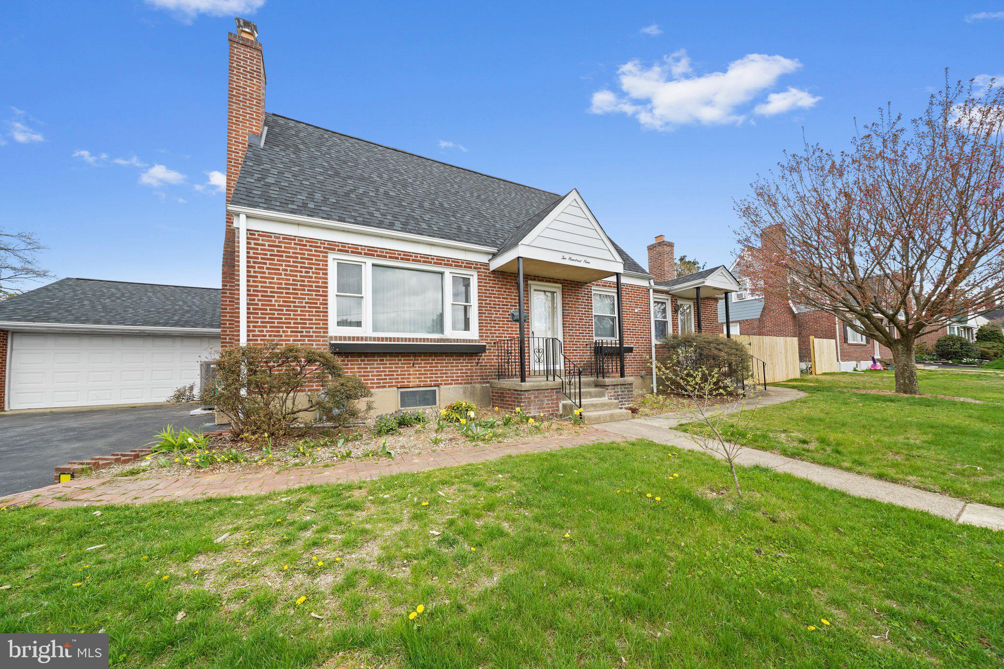Welcome to 209 2nd Ave, a unique five bedroom two bath brick cape in the Heart of Broomall! Step inside to a warm and inviting living room featuring a wood-burning fireplace—perfect for cozy evenings. The main floor also includes a comfortable first-floor bedroom and a full bath, ideal for guests or flexible living.
Continue through to the kitchen, complete with newer appliances, which opens to a spacious family room on one side and a formal dining room on the other. Beyond the dining room, you’ll find a second family room with a gas fireplace—great for gatherings or quiet nights in. From here, step out to the enclosed three-season patio, offering extra space to relax or entertain.
Upstairs, you’ll find four additional bedrooms, each with unique vaulted ceilings, built-in drawers, and charming bookshelves that add both character and storage. A full bath completes the upper level.
The finished basement provides a large recreation area, plus a sizable storage room that includes laundry—perfect for keeping things organized and out of sight.
This home is full of thoughtful updates, timeless character, and versatile living spaces. Don’t miss your chance to make it yours!