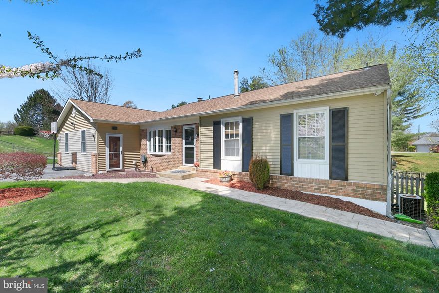 Welcome to 498 Tanglewood! This charming ranch-style home sits on approximately 1.34 acres and offers 4 bedrooms, 3 full bathrooms, and a dedicated office space. The inviting front features a large bay window that fills the room with natural light, creating a bright and airy atmosphere. As you enter, you’ll be greeted by a newly renovated, open-concept kitchen with a spacious island, granite countertops, a farmhouse sink, and beautiful hardwood floors—making it the perfect gathering space for family and friends.

Off the kitchen, step down into a generous family room and play area, created by professionally converting the garage. The master bedroom includes its own private bathroom and French doors that open onto the deck, a lovely spot for morning coffee or enjoying evening sunsets.

The walkout basement features a cozy family room with a fireplace and new flooring, along with an additional bedroom and kitchenette area, ideal for guests or a potential wet bar.

Outside, you'll find a covered patio, a fire pit, a wooden swing set, and a large shed with a workbench. The expansive backyard offers plenty of space for relaxation or hosting a barbecue with family and neighbors.

The private driveway ensures plenty of parking, with additional community on-street parking for guests. Located just minutes from Linton Springs Elementary and Century High School, this home combines comfort and convenience in a fantastic location.