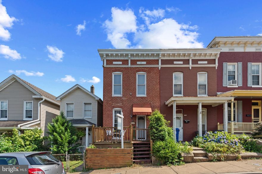 This MOVE IN READY solid brick rowhome sits on a quiet street and is just minutes to everything!  1,500 sq feet of above ground living space,  AND a large fenced back yard.  Big UPDATES include Central AC, HVAC, Water Heater, flooring, fresh paint, new gas stove, dishwasher and microwave.  You will love the flow of the house with its' 9 foot high ceilings, spacious kitchen & outdoor living spaces.  The large unfinished basement makes a great exercise room or update it for whatever space you need.  Want a main level bathroom?  Move the washer/dryer to downstairs and you'll have the space to put one in.  Located just minutes to everything including downtown Hampden, Johns Hopkins, Druid Hill Park and the Baltimore Museum of Art just to name a few.  Easy access to all the restaurants and culture that Baltimore has to offer!  Meticulously maintained with plenty of street parking right in front of the house.  An ideal home whether you are looking for your first house, ready to downsize or want to invest in a home with excellent rental potential.