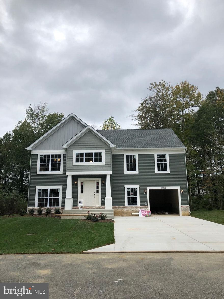 Sold & Settled revised layout Sotterly #2  home @ Elizabeth Hills. This split foyer home features 3 bedrooms on the main level w/ 2 full baths. Lower level will feature rec room, den/4th bedroom, full bath &laundry. Interior features will include stainless steel appliances, granite kitchen counters, ceiling fan prewires in all the bedrooms and family room, upgraded carpet, hardwood foyer, ceramic floors and surrounds in the owners bath, plus upgraded lighting in the kitchen and family room. A 12x12 composite deck with stairs to grade will also be featured at the back of the family room w. a 10'x12' concrete patio underneath. Backyard is fenced in with 6' white privacy fence, on a site b