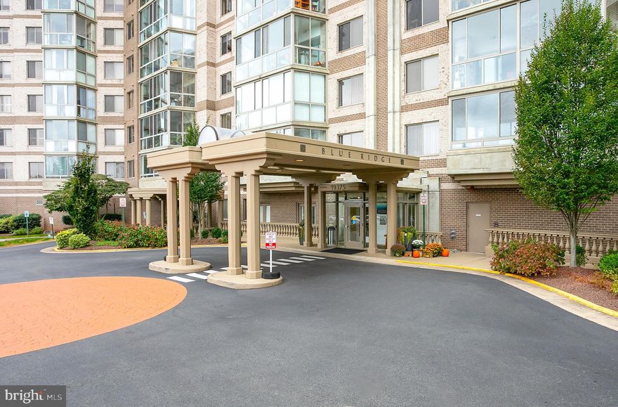 Elegant 2BR/2BA Corner unit with breathtaking views of trees private garden and Vibrant 55+ Community Living in the renowned Lansdowne Woods of Virginia  walk into the refined comfort in this beautifully updated 2-bedroom and Den, 2-bathroom condominium offering 1,441 square feet of open living space in the sought-after Blue Ridge of Lansdowne Woods. Located in a secure, gated enclave at 19375 Cypress Ridge Terrace, Unit 418, this residence perfectly blends sophistication and serenity. A welcoming foyer leads you to the living room, dining room, and glass-enclosed balcony, ideal for hosting family or entertaining friends. The newly renovated kitchen features Granite countertops, white cabinets, and state-of-the-art appliances,upgraded Carrier HVAC system ensures year-round climate control. The living area is bathed in natural light and offers a cozy gas fireplace, a flexible home office or den area, and newer flooring throughout. Enjoy breathtaking garden views from the solarium, perfect for morning coffee or quiet evenings. The primary suite is designed for relaxation, featuring ample closet space, a walk-in closet, a tub, and a walk-in shower in the en-suite bath. A spacious second bedroom and full guest bath make hosting loved ones a breeze. There is an extra storage area that adds convenience to this condo and comes with a garage parking space. 
Community amenities abound: The ClubHouse, the indoor heated pool, modern fitness center, tennis courts, pickleball, billiards, game rooms, library, and even a movie theater. Weekly games of Rummikub, Scrabble, and Bridge, a monthly book club, community potlucks, and an on-site restaurant make it easy to connect and thrive. More information can be found at the Lansdowne Woods of Virginia site. Whether seeking a peaceful retreat or an active lifestyle, this condo offers the best of both worlds. Experience luxurious living with a warm community feel and the convenience of Loudoun County.