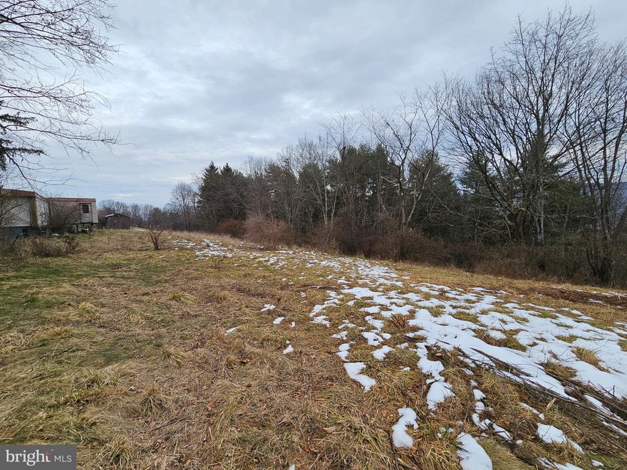 ACERAGE MINUTES FROM 68, GREEN RIDGE STATE FOREST, INCLUDES TAX ID 0101095439 AND 0101094637 FOR TOTAL OF 28.96 ACRES.   WAITING FOR YOU TO  BUILD YOUR DREAM HOME.  (UTILITES EXIST) LEVEL CLEARED AREA  FRONTS GREEN RIDGE ROAD THEN GOES IN WOODED AREA, 2ND PARCEL WOODED CAN BE PURCHASED FOR HUNTING OR RECREATION,  PROPERTY ALSO HAS A MOBILE HOME ON IT THAT CONVEYS AT NO VALUE.  MOBILE HOME HAS NOT BEEN LIVED IN OR USED FOR OVER 10 YEARS., BUT MAY BE ABLE TO BE REHABBED FOR HUNTING CABIN.