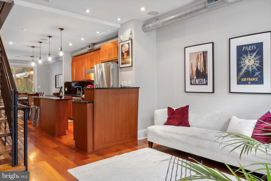 Beautiful updated 3 bed/2.5 ba in the Meredith Catchment on a quiet block in Queen Village.    Designed by Philadelphia architect,  Adam Zangrilli, the builder selected the finest quality materials including Artemide lighting, Porcelanosa tiles and custom Jeld-Wen windows to create a one-of-a-kind, three story urban stunner.  Open floor plan, Brazilian cherry hardwoods throughout and lots of storage.  Meticulously finished exposed and sealed brick, chef's kitchen with custom Omega cabinetry,  gas stovetop, 1st floor powder room!!!,  2 zone hvac all leading to a backyard garden oasis  - a lovely and calming retreat from the hectic rush of the city. Additionally a finished and professionally waterproofed basement with polished concrete flooring featuring a gas burning fireplace and huge closets. Upstairs are three wonderfully proportioned bedrooms, 2 on the second floor with a modern bathroom, and the master on the 3rd floor with a walk through closet and a luxuriously well-appointed bathroom.  This is not to be missed.