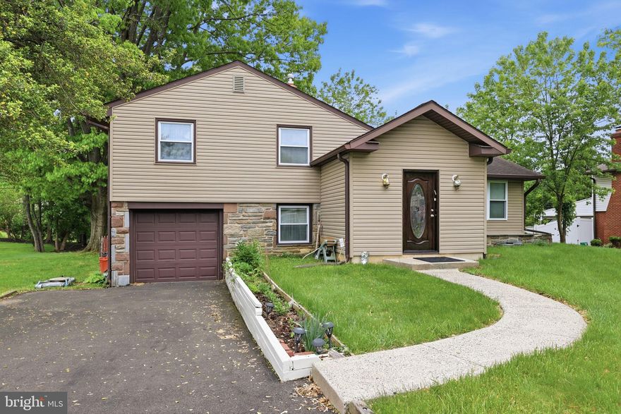 Welcome to this exceptional split-level residence in the heart of desirable Huntingdon Valley, offering the perfect combination of elegance, space, and comfort. This beautifully maintained home features 5 spacious bedrooms, 3 full bathrooms, and a versatile layout designed for modern living. From the moment you enter, you’ll appreciate the bright sun-filled rooms, soaring sense of space, and warm inviting atmosphere throughout. The expansive living and dining areas are ideal for entertaining, while the thoughtfully designed kitchen flows seamlessly into comfortable everyday living spaces. A finished basement adds valuable additional living space perfect for a media room, playroom, home office, gym, or guest retreat. Step outside to enjoy a private backyard oasis with plenty of room for gatherings, relaxation, and outdoor enjoyment. Located on a quiet tree-lined street in sought-after Abington Township, this home offers convenient access to parks, shopping, dining, major roadways, and public transportation. Rarely does a home offering this much space, flexibility, and location become available. Truly a wonderful place to call home.
