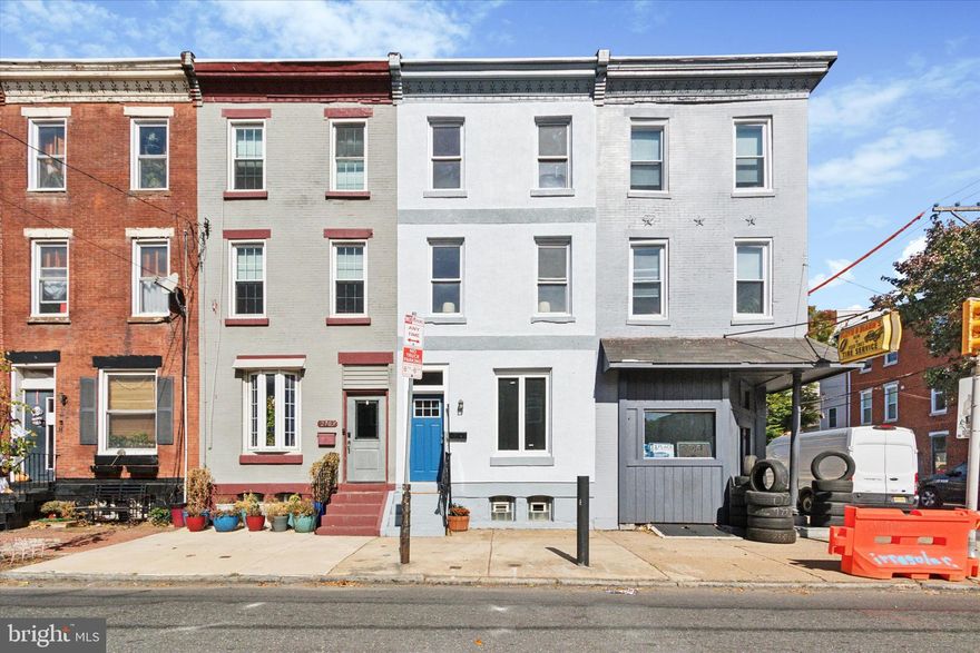 Welcome to 2703 Poplar Street, a quintessential Philadelphia townhome nestled in the heart of the Fairmount neighborhood. This charming 4-bedroom home seamlessly blends historic architectural elements with modern comforts. High ceilings, hardwood floors, and abundant natural light create an inviting atmosphere throughout. As you enter, you’re greeted by an open and spacious first floor, where a beautiful archway elegantly connects the family and living rooms to the kitchen. The back patio offers a perfect spot to unwind, with space for a cozy seating area to enjoy the fresh evening air. On the second floor, you’ll find two generously sized bedrooms and a large full bath with a soaking tub. The convenience of having the washer and dryer on this level eliminates the need to carry laundry up and down stairs. The third floor boasts two additional bedrooms, each offering picturesque views of the city. This home’s incredible location places you within walking distance of local neighborhood bars, restaurants, Fairmount Park, The Art Museum, and provides easy access to I-76 and Kelly Drive. Don’t miss the opportunity to make this Fairmount gem your own. Schedule a private tour today!