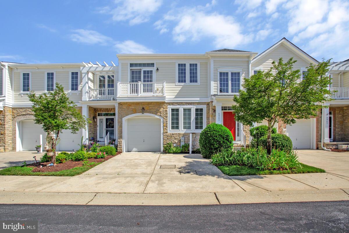 Grand 55+ living lifestyle awaits in highly desired Snowden Overlook! Leave the outside maintenance & headaches behind, but don't give up the square footage you deserve for entertaining, hosting guests, & comfortable day to day living. This villa is situated in the back of the community offering your own garage plus 2 car driveway and generous guest parking (there are no homes across the street, just woods & parking spots). This light filled layout includes: a dramatic two story entry foyer; a formal dining room; efficient eat in island kitchen (with granite counters, double wall ovens, & stainless appliances) opening directly to an impressive 2 story gathering room with cozy gas fireplace + access to the rear patio. The main level is complete with a primary bedroom suite, full sized washer/dryer, and powder room. The versatile upper level has a generous loft perfect for tv/movie watching, computer work, or exercise; 2 large bedrooms & a full bath. The lower level includes a full bath & several other finished, flexible spaces for hobbies, crafts, a theatre room, & so much more. GAS heating / AC new in 2021; water heater new in 2024; brand new refrigerator & dishwasher; freshly painted from top to bottom; new carpeting main & upper levels; handsome hardwood flooring in the foyer/dining room/kitchen/ & living room. Step up to this relaxed type of living with easy access to the tremendous clubhouse ( staffed full-time), pool (complete with a kiddie pool, life guards and lounge chairs, gym), gathering spaces & ultra convenient location near shopping, restaurants, downtown Columbia amenities , parks, walking trails, and cultural activities. The entrance gate and guard house are manned from 8 PM to 5 AM daily.("Other Fee" of $1,736.58 is the annual Columbia Association fee)