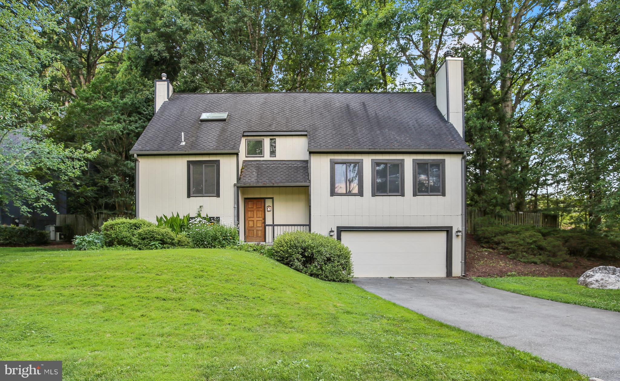 This property is a unique blend of move-in ready now with build-out potential on the existing parcel footprint later; the HOA is informal and comprised of a close-knit cul-de-sac community.
The backyard arboretum has been lovingly cultivated over 35 years and offers a peaceful private retreat with a variety of mature hardwoods and pines. The forest behind the home is deeded to the Maryland Nature Conservancy and is permanently preserved as greenspace. In addition, the property benefits from an informal easement that provides additional usable yard space beyond the rear property line, a rare feature among Angus Place neighbors.
This is a three bedroom home with two bedrooms on the main level and a primary suite in the loft above. The current owner recently combined the two main level bedrooms into a spacious office suite, which can easily be converted back to two separate bedrooms. The open loft can also be enclosed to create a fourth bedroom if desired.
Recent improvements include:
* Three level exterior built elevator with wood paneling installed in 2018
* Floating wood burning fireplace with masonry hearth and log storage completed in 2024
* Spa bathroom with jacuzzi tub and rainforest shower added in 2019
* New masonry steps and front stoop completed in 2021
* Basement apartment with bathroom, tiled shower, kitchenette, and separate entrance added in 2021
* Ceiling recessed lights, chandelier, and pendant lighting updated throughout in 2024
* Laminate decking installed in 2015
* Skylights in the bedroom added in 2018
* Third floor washer and dryer installed in 2018
* Architectural tile roof completed in 2010
* Double paned sliding windows installed in 2005
* Outdoor gas grill added in 2010
* Gas furnace and air conditioning compressor replaced in 2008
This home offers architectural interest, functional upgrades, and a tranquil setting surrounded by protected nature. It is a rare offering in a sought after Potomac neighborhood.