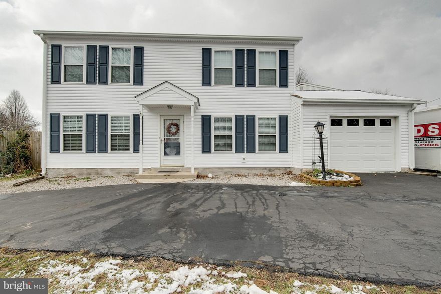 Fully renovated kitchen with new cabinets, tile floor and appliances.  All Bathrooms Renovated w/ Tile, New HWD Staircase & Floors, Ceiling Fans in Every Room, Entire Interior Freshly Painted, Tile entryway. New Roof w/gutter system, New Windows, New Plumbing throughout house, New HW Heater, Landscaped front & back yard with Organic Garden, Fenced in Yard, Circular Drive with RV/Boat parking.