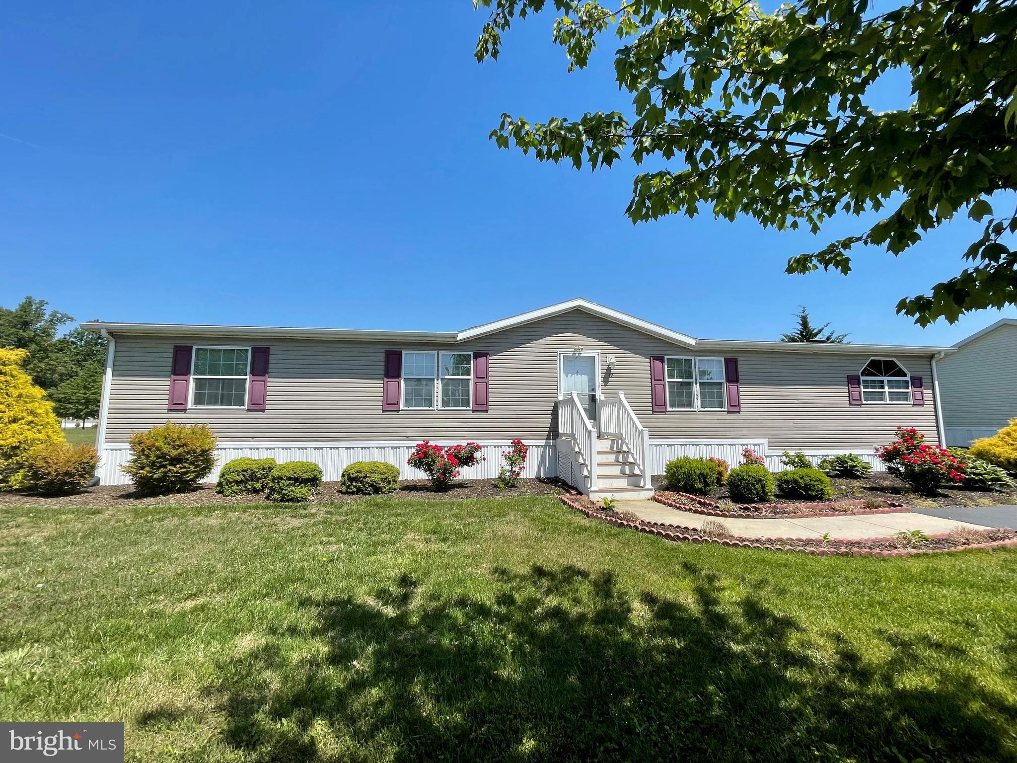LARGE Mobile Home in Maybelle Manor - 3 Bd 2 Bath - Features Include: Eat-in kitchen - WOOD fireplace in Family Room - Owner's suite with Garden tub - walk-in closets - Separate laundry room - LARGE deck backs to open space - 2-3 car driveway - nicely landscaped lot - Storage Shed - Minutes to Harford County - $550 Monthly Ground Rent - Must be approved by community.