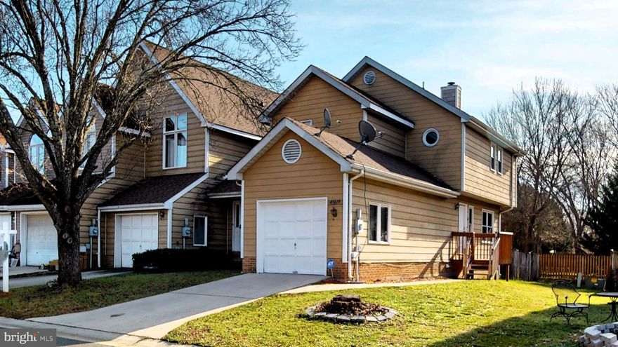 This home is ready for immediate move-in.  House priced accordingly providing an opportunity to invest in potential house upgrades.  2024 is your season, make this home yours!  
Perfect location - Just minutes from PAX River Naval Air Station - Shopping - Local Restaurants.  This end-unit townhome includes a single-car garage.  The main level features a connecting living room and dining room with a welcoming fire place,  an eat-in kitchen and a convenient half bath.   A sliding glass door opens to the fenced backyard, providing a secure space for family gatherings or a safe environment for kids to play.   The spacious owner's suite features an ensuite, stunning cherry hardwood floors and a vaulted ceiling adorned with a ceiling fan.  The flooring in the upstairs hallway continues with stunning cherry hardwod.  The secondary bedrooms boast newer installed carpeting.  The basement includes a recreational room, laundry/storage area and a rough-in for a future bathroom.   
USDA eligible.