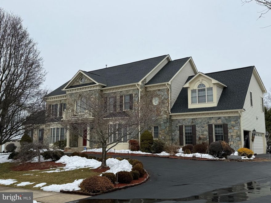 Welcome to 16809 Harbour Town Rd—an estate-level residence backing directly to the golf course, offering incredible privacy, scale, and openness from the moment you step into the grand circular staircase foyer and into the soaring two-story family room filled with natural light; this beautifully refreshed 4-level stone-front Kenwood model features a fully updated kitchen with a striking quartz waterfall island and expansive entertaining spaces, complemented by 3 fireplaces, a custom oversized wet bar, and a sun-drenched solarium; the home offers 7 bedrooms, 2 dens, and a luxurious primary suite with cathedral ceilings, while a circular driveway and 3-car garage complete the impressive exterior presence; set on a premium golf course lot with endless space to live and entertain—this is true estate living, priced to sell and not to be missed.