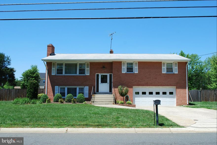 ESTATE SALE, FHA approved. quick settlement.. Home is all brick, Largest lot in Surratts Gardens. HUGE fenced backyard. Newer roof, Updated windows,  AC system, all appliances less than 10 years old. HW floors under carpets. tile bathrooms. Large rooms, wetbar in the basement. Oversized 2 car garage. Professionally landscaped. So much potential in this Old Goode Quality construction. .