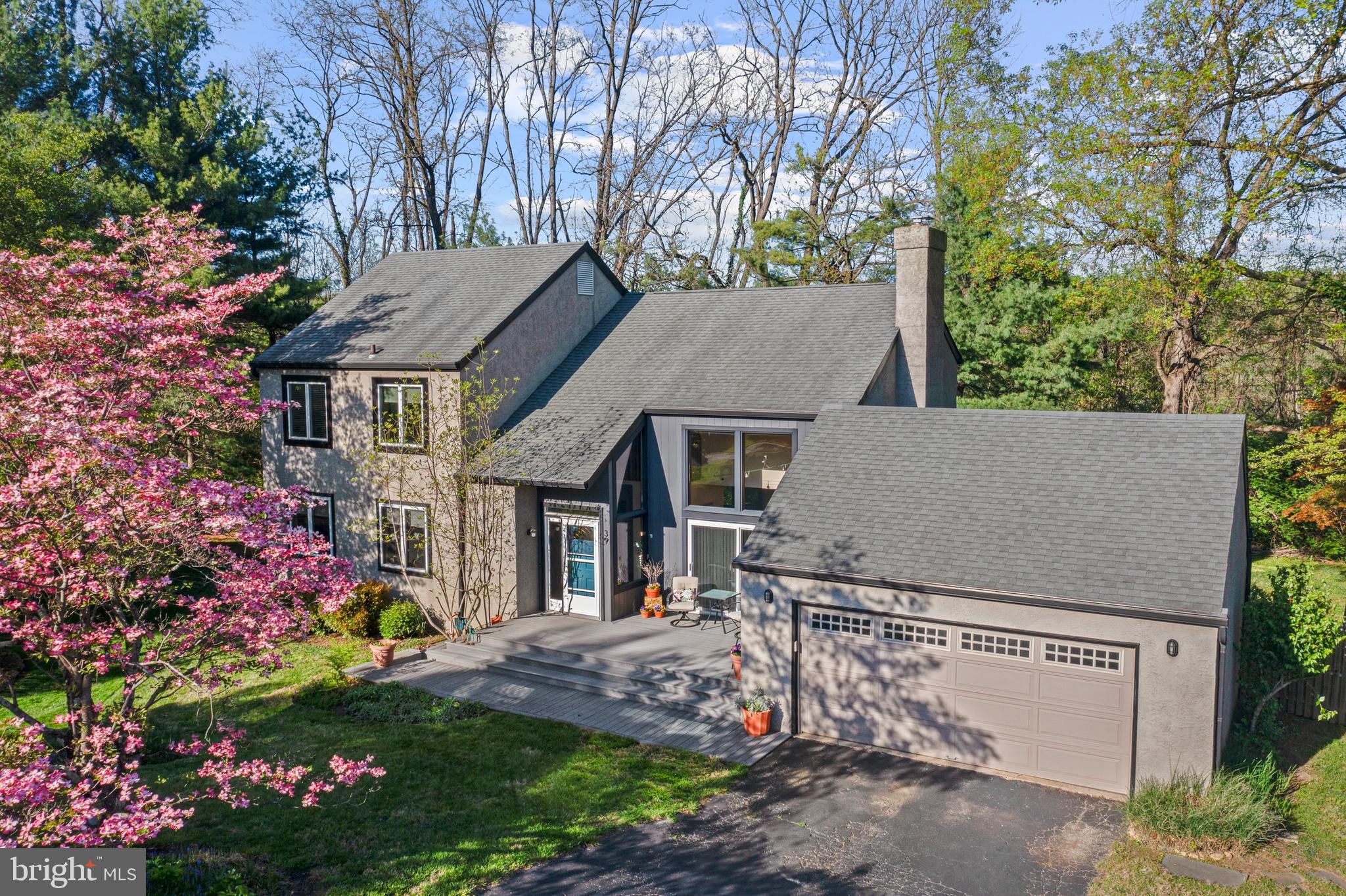 Tucked away on a cul-de-sac in the popular Ithan Mills neighborhood of Bryn Mawr, this contemporary home offers 4 Bedrooms, 2.5 Baths, and is located in award-winning Radnor Township School District — just a short walk from Ithan Elementary School.
Enter through a stunning, sun-drenched , 2-story Foyer with an overhead loft. The bright Family Room has a vaulted ceiling, gas fireplace, and walls of sliding glass doors which open to the front and rear decks.
The Family Room is open to the Breakfast Room and to the spacious Kitchen, which offers tall cabinets which offer ample storage space . There’s also a separate formal Dining Room and a sunny Living Room, offering multiple areas for gathering with friends and family.
Upstairs, the Primary Bedroom includes a large walk-in closet with custom organizers and a remodeled en-suite Bath. Three more Bedrooms share a remodeled Hall Bath. All the Bedroom closets have custom organizers and they have wood floors underneath the wall-to-wall carpeting. The second-floor landing includes a large linen closet and a bonus area which overlooks the 2-story Entrance Hall — perfect for a desk, homework station, or reading corner.
The finished Lower Level adds even more living space, with a large Recreation Room that features built-ins and 2 cedar closets plus 2 storage closets (with custom organizers.) A separate Bonus Room could be used for a home office, gym, music room, or potential 5th Bedroom. The oversized 2-car attached Garage and a partially-finished lower level Laundry Room complete this spacious home.
Outside, you’ll enjoy relaxing on the front and rear decks, overlooking the half-acre property which offers ample room for gardening and recreation.
The convenient location has easy access to the Blue Route (476), Airport, Center City, corporate centers, Bryn Mawr Hospital, Bryn Mawr Film Institute, Villanova University, Clem Macrone Park, shopping, and restaurants in Garrett Hill, downtown Bryn Mawr, Villanova, and Wayne.
Showings start Thursday June 19th.