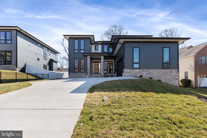 Project completed! This light-filled, exceptional new construction sits on a one-third acre lot inside the Beltway. Located at 4017 Woodland Dr, this stunning residence offers over 6,300+ sq ft of luxury living across three beautifully finished levels.

The main level features 10’ ceilings, a spacious great room with a tray ceiling, a chef’s kitchen with a butler’s pantry, a dedicated study/bedroom, and a mudroom complete with a built-in dog washing station.

The upper level showcases a grand primary suite with a spa-style bath, along with four generously sized bedrooms, each featuring walk-in closets and direct access to a bathroom.

The fully finished walkout basement is perfect for entertaining and everyday living, offering a media room, game area, gym, wet bar, and two full baths.

Situated on a quiet corner just minutes from popular shopping plazas, dining, and major commuter routes.