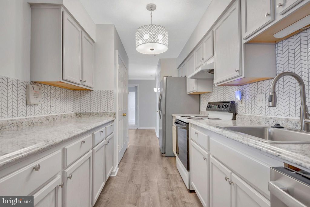 Photo of 3710 Excalibur Court #103, BOWIE, MD 20716 (MLS # MDPG2179224)
