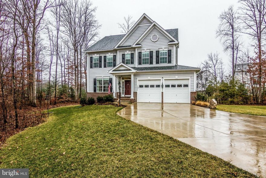 This is a MUST SEE!  Upgrades, amenities only add to an already stunning home.  Four bedroom (potential fifth), 4.5 bathrooms, spacious kitchen family room with designer cabinets, granite countertops, stainless steel appliances, 9  ceilings, gas fireplace and lots of natural light.  Home is fully wired for the future and also has a Security/Intercom system.  This could be yours!!