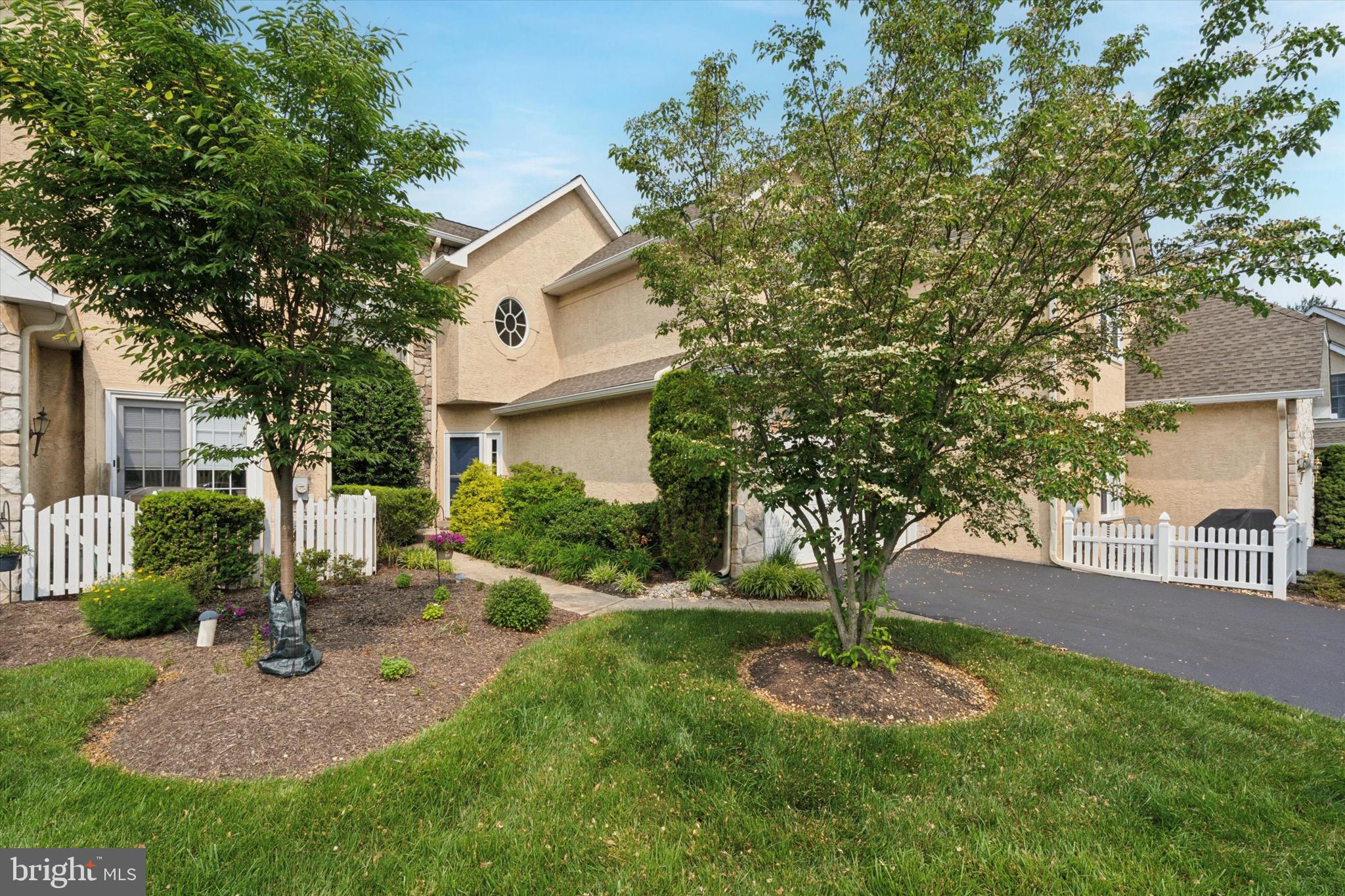 This lovingly maintained carriage house in the desirable Blue Bell Country Club has 3 bedrooms, 2.5 baths plus a loft that can be used as a 4th bedroom or office which is not often available in the carriage houses. This home boasts an inviting open floor plan complemented by hardwood floors throughout the first level, creating a warm and welcoming atmosphere while providing ample space for relaxation and entertainment. The primary suite is a retreat in itself, featuring two expansive walk-in closets and a luxurious bathroom equipped with a double vanity, jetted tub, and stall shower. Two additional bedrooms and a full bath complete the second floor. A large deck out back provides an ideal setting for outdoor gatherings. The property also includes a two-car garage, finished basement, and plenty of storage space. Embrace the charm and comfort of this exceptional home in a community that offers a blend of elegance and convenience. BRAND NEW AIR CONDITIONING! And Stucco has been remediated! The community center, one of the benefits of living in the Country Club community, is a short walking distance from the house and provides home owners with multiple pools, tennis courts, pickle ball courts, playground and gym. Also conveniently located near public transportation, excellent restaurants and shopping as well as being located in the highly rated Wissahickon school district. Schedule your tour today! Don't miss out on this fantastic opportunity to make this home yours!!