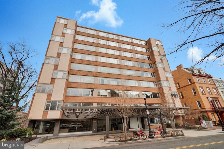 This charming junior 1-bedroom, 1-bathroom condo is situated in the heart of Dupont Circle, offering the perfect blend of convenience and vibrant city living. The bright and inviting living room boasts ample natural light, creating a warm and welcoming atmosphere. Located in a pet-friendly community (allowing two pets with no weight limit), this building offers top-notch amenities, including a 24/7 front desk, on-site management, a breathtaking rooftop deck with panoramic city views, and all utilities included in the condo fee. Additional conveniences such as a common laundry area, storage space, and bike storage make everyday living effortless. Enjoy unparalleled access to everything Dupont Circle has to offer—walk to shops, the Farmers Market, renowned restaurants, and exciting nightlife. Just one block from the Dupont Circle Metro and steps from multiple bus routes, this location is ideal for commuters and city enthusiasts alike. Don't miss this incredible opportunity!