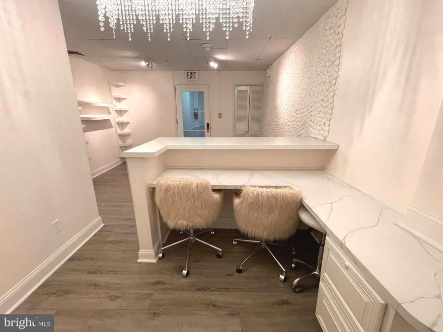 Don’t miss this incredible opportunity to own a private, first-floor commercial unit in the desirable 1401 Pennsylvania Condominium Apartments! Perfect for professionals, entrepreneurs, or small business owners, this versatile space offers convenience, security, and flexibility to bring your vision to life. Step inside to a bright, welcoming reception area, three separate rooms/workstations, an updated bathroom, and a dedicated storage area – giving you plenty of space to customize for your unique business needs. Whether you’re a business professional, esthetician, hairstylist, therapist, or creative entrepreneur, this unit is ready to adapt to you. Enjoy peace of mind with 24-hour security personnel and a monthly condo fee that covers building maintenance, utilities (excluding internet and cable), and one off-site parking spot with Valet– adding tremendous value and convenience. Located just minutes from downtown Wilmington, Trolley Square, parks, and popular restaurants, and with easy access to I-95, this space offers unmatched accessibility for both you and your clients.  Schedule your showing today and see how this space can help take your business to the next level!