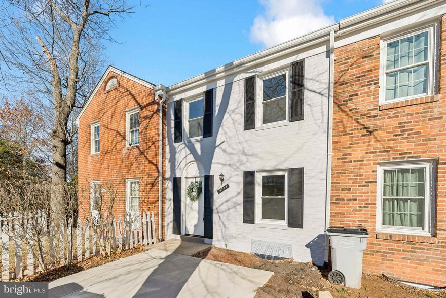 Fully renovated townhouse in Georgetown South, Manassas VA, move-in ready and walkable to Historic Downtown Manassas and the VRE. This completely remodeled home features new windows, a newer roof, new luxury vinyl plank flooring, brand-new carpet, new stairs with wood treads, and an updated banister, offering modern finishes throughout all three levels.  This remodel was done with care with only the new homeowner in mind!  It is not a shoddy flip!

The remodeled kitchen includes new white cabinets, white solid-surface countertops, and brand-new stainless steel appliances, opening to a dedicated dining area. The main level offers a large, sun-filled living room, a convenient half bathroom, and a coat closet, making the layout both functional and inviting.

The upper level features three bedrooms and one full bathroom, with a spacious primary bedroom finished with brand-new carpet. The finished lower level includes a large recreation room, laundry area, and sliding glass door to a private patio backing to common area and wooded views, providing privacy and outdoor space.

Located in the established Georgetown South community, this townhouse is walking distance to Historic Downtown Manassas, the Manassas VRE station, bus stops, and a grocery store, offering excellent commuter access and everyday convenience. Close to dining, shopping, entertainment, and major commuter routes.

Turnkey, fully renovated, and ideally located, this Manassas townhouse offers modern living, walkability, and value in one of the area’s most convenient neighborhoods.