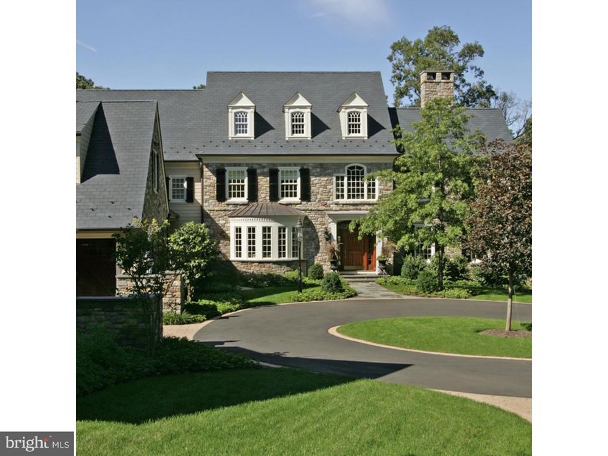 Tucked into one of the loveliest communities in Upper Makefield, sits this gorgeous custom built home by Trueblood Design Build.   No detail of this stunning estate is overlooked from the custom walnut flooring throughout the home, the custom cabinetry and built ins, the spring fed pond and spring house and the custom cabana house are just a few of the exquisite features of the estate.  Enter this home to gracious formal dining room and formal living room with on site custom built ins and fireplace. Raised paneling study with fireplace with marble surround has long distance views out every window. Stunning gourmet kitchen with onsite custom cabinets, high end appliances and bakers table  is adjacent to  "grill room", both rooms have large walk in fireplaces. Wood paneled family room with wall to ceiling windows and incredible walk in bay window. Upstairs is a sumptuous master bedroom with his and her walk in closets, sitting room with built in espresso machine, elegant master bath with clawed tub, towel warmer and mosaic inset medallion. Three additional en-suite bedrooms with gorgeous baths and walk in closets. In law suite with entry from three floor elevator. Downstairs is a master piece bar, wine cellar, ladies lounge with raised paneling and fireplace.  Pool room, game room and play room complete the lower level. Finishes include limestone flooring, slate floors, travertine and walnut hardwood floor. Stone retaining walls, custom landscaping, 2 car detached garage and 2 car attached fireplace, cabana house with full kitchen, fireplace and loft. In-ground pool and slate patios on multiple levels makes this estate both lush and private. 10 fireplaces throughout the home, elegant and stunning fixtures and custom window treatments throughout. One of the finest, luxury homes in Bucks County.