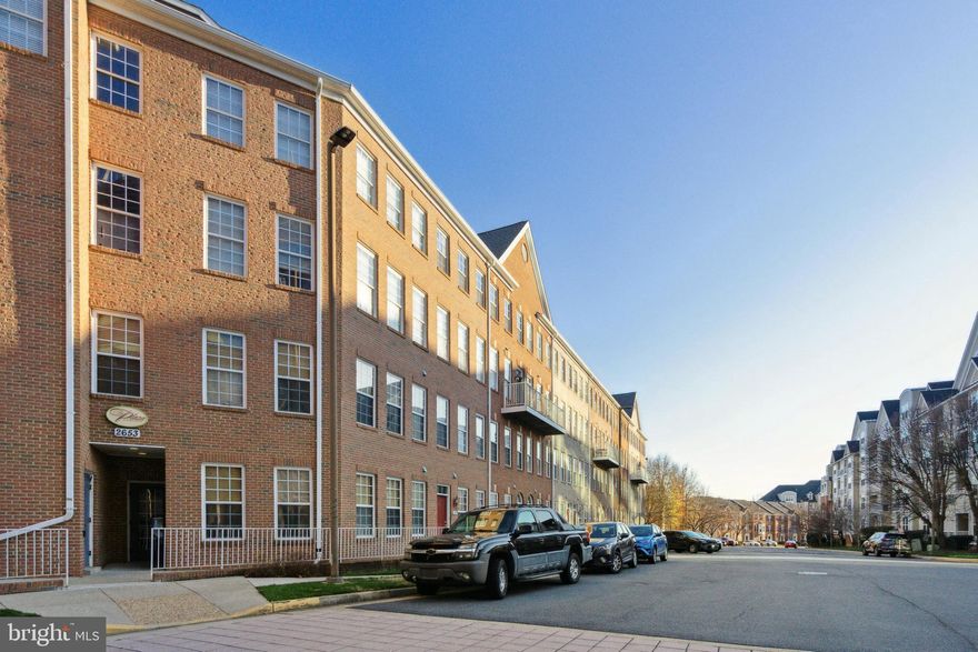 PENDING RELEASE>>  What a GREAT Floorplan!!> 2-LEVEL Condo with an Open Concept Floorplan makes you feel Right at Home!>Its Amazing Location makes Living a Breeze!>>Gleaming Hardwood Floors grace the Entire Main Level>The amazing [almost] Floor to Ceiling Windows include an Atrium Door to the Balcony>Your Kitchen boasts Corian Countertops, a real Pantry, and a Bar-top for casual meals>There's space for a Dining Table, too!!> Both rooms overlook the Living Room [Great Room] w/Gas Fireplace including a Mantle>Upper Level is graced by Brand New Carpet with Upgraded Pad, and offers a Full-Sized Laundry>Your Primary Bedroom features a New Ceiling Fan,  Great Walk-in Closet, and a Luxury Master Bath with a Double Vanity, New Comfort Height commode plus Separate Soaking Tub and Shower>  Both Full Bathrooms on the Upper Level have had ALL of the Grout and Caulking Replaced, and Shine like a new penny!!>Both Bedrooms are fit for a King [sized bed]!  2nd Bedroom also provides another wonderful Walk-in Closet> The Wall of Windows upstairs is a sight to behold, too !  1 CAR GARAGE included in Sales Price> Additional Parking with 1 Permit and ""Festival Parking"" available too!>Westbriar Plaza includes Pool  + Fitness Center/Clubhouse>   The 7 minute stroll [ .2 Miles] to the Dunn Loring Metro makes for a Wonderful Commute! Plus, an Evening Out at Mosaic District's Restaurants, Organic Market, Starbucks, even Primary Care is right at your Doorstep>  The WO&D Bike Trail is just a pedal away>>Don't miss this Beauty!!  Live Well!!!  Ready??  PENDING RELEASE