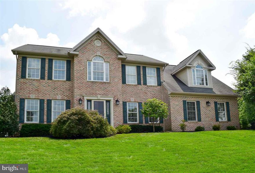 Elegant one-owner colonial spares no detail! Gourmet Kit w/ Wolf range, Sub-Zero fridge & wine chiller, island w/ prep sink. MBR w/ W-I closet & sumptuous BA w/ oversize glass shower & soaking tub. 1st Fl FR w/ gas FP, huge SunRm, generous BRs, W-O bsmt w/ 3 bonus rms, 2nd Kit & full BA. Vaulted ceilings, hdwd, granite, tile & premium amenities thruout. Must see!