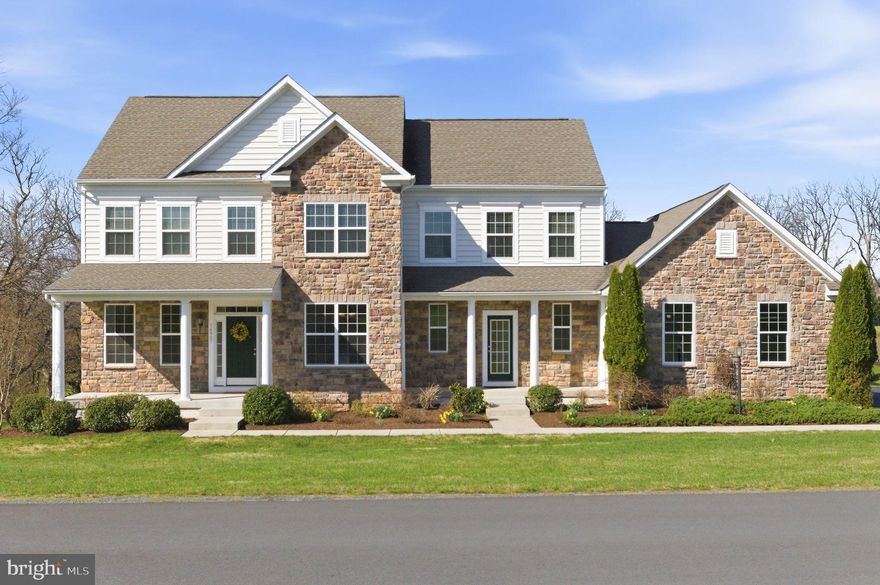 Welcome to 14997 Lynnford Ct in the sought-after Reserve at Waterford, beautifully situated on 1.67 acres with scenic and mountain views. This spacious K. Hovnanian Albany model offers 5 bedrooms, 4 full baths, 1 half bath, and a 3-car garage, with thoughtful upgrades and abundant natural light throughout.

The main level features hardwood flooring, a gourmet kitchen with stainless steel appliances and granite countertops, and comfortable gathering spaces ideal for everyday living and entertaining. The Grand Morning Room extension expands the family room, breakfast area, office, and upper level, creating an open and inviting flow. Shiplap accents in the family room and laundry room add custom character, while the main-level office provides an ideal space for remote or hybrid work. A spacious main-level laundry room also functions perfectly as a practical everyday drop zone.

The upper level features a spacious primary suite with a walk-in closet and ensuite bath complete with a soaking tub and separate shower. Two additional bedrooms each feature private ensuite full baths, while two additional bedrooms share a full bath, providing comfortable accommodations for family or guests.

Outdoor living is exceptional with a 20x20 screened porch and 16x20 Trex deck with stairs, a $90,000 seller addition designed for relaxing, entertaining, and enjoying the surrounding views.

The walkout lower level remains unfinished, offering excellent potential for future living space, recreation, or multi-generational possibilities.

Ideally located near Historic Waterford and just minutes to the shops, dining, and amenities of Purcellville and Leesburg.

Open Houses: Saturday & Sunday, 2:00–4:00 PM.